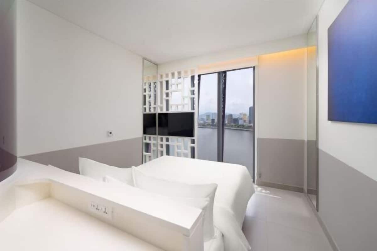Premium bedding, down comforters, Select Comfort beds, minibar