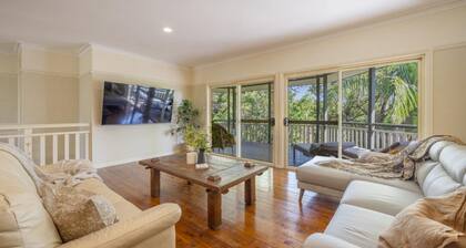 Indulge in the luxury and tranquillity of Treetop Retreat, located in the charming village of Woolow