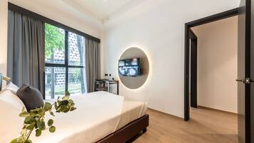 Deluxe Room, 2 Bedrooms | Minibar, individually furnished, desk, free WiFi