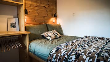 1 bedroom, desk, iron/ironing board, travel crib