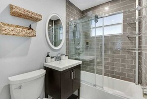 Shower, hair dryer, towels