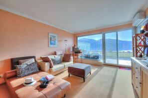 Family Apartment, 2 Bedrooms, 2 Bathrooms, Mountainside (Panorama maggiore apartment) | Living area | TV
