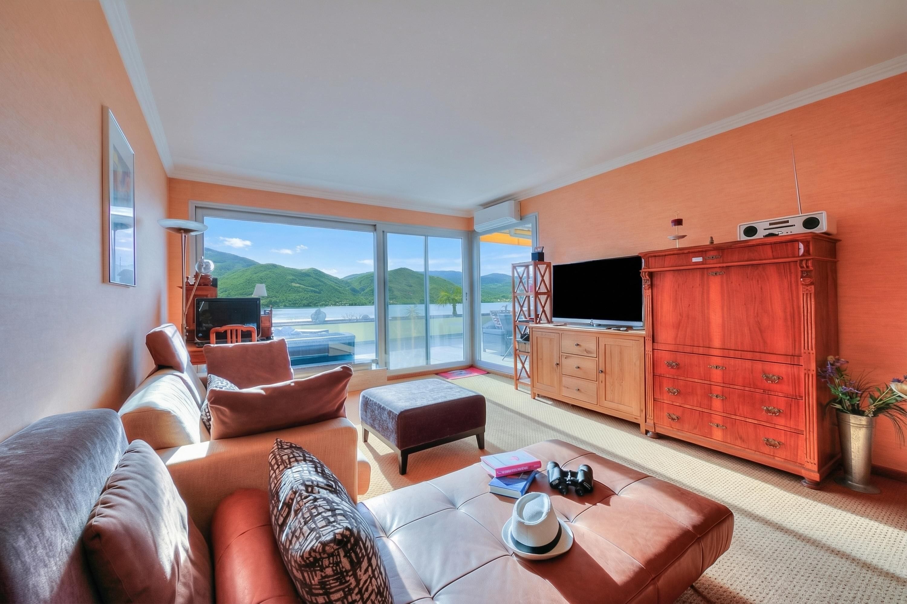 Family Apartment, Multiple Bedrooms, 2 Bathrooms, Mountainside (Panorama maggiore apartment) | Living area | 21-inch TV with cable channels