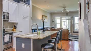 Fridge, coffee/tea maker, cookware/dishes/utensils