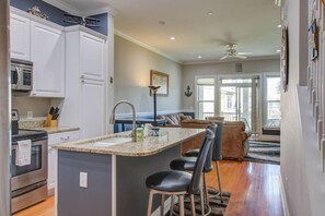 Fridge, coffee/tea maker, cookware/dishes/utensils