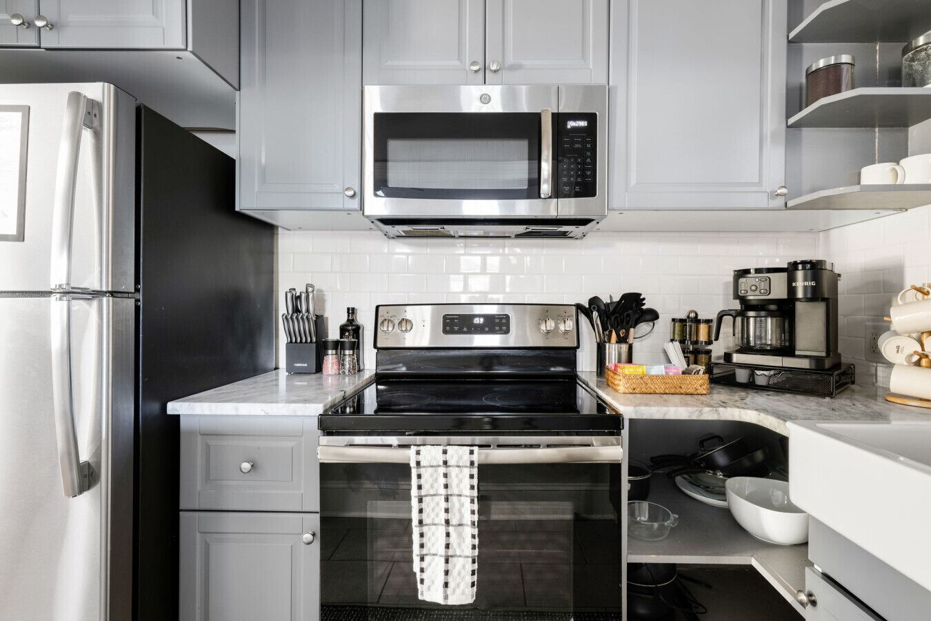 Fridge, coffee/tea maker, cookware/dishes/utensils