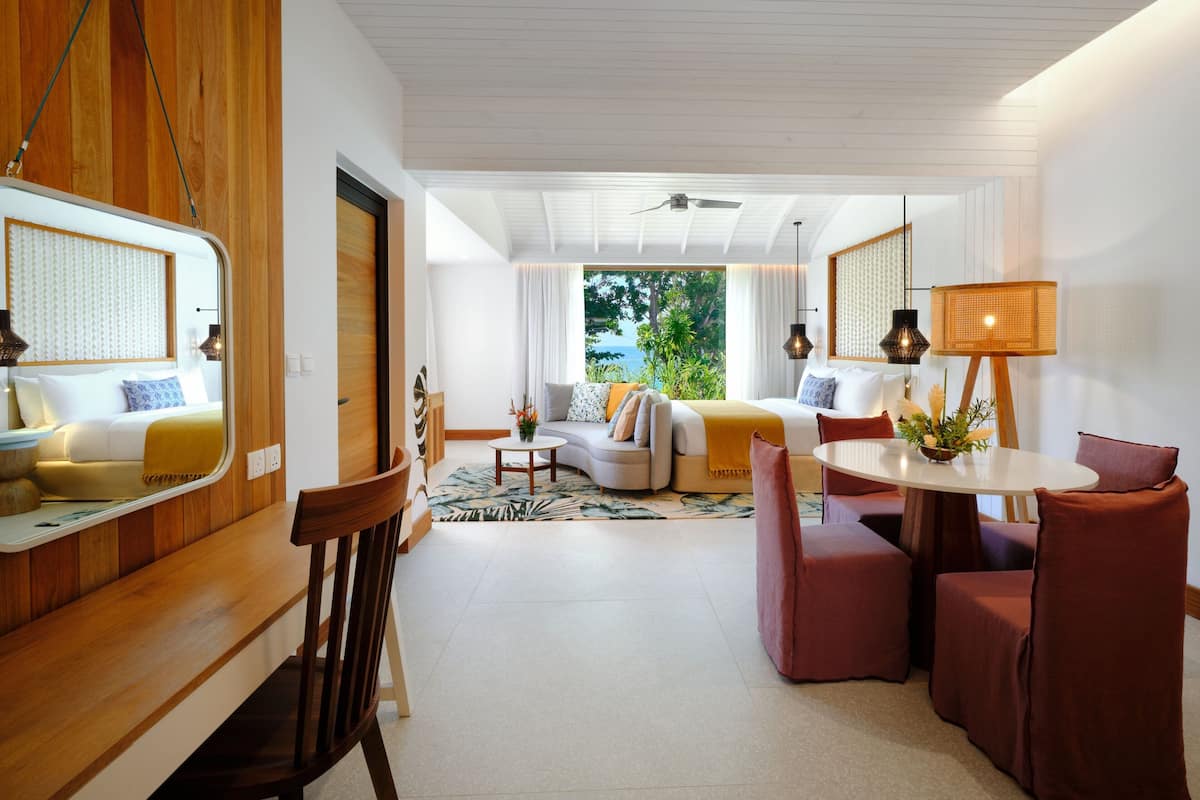 Signature Suite, 1 King Bed, Patio, Sea View | 1 bedroom, minibar, in-room safe, individually decorated