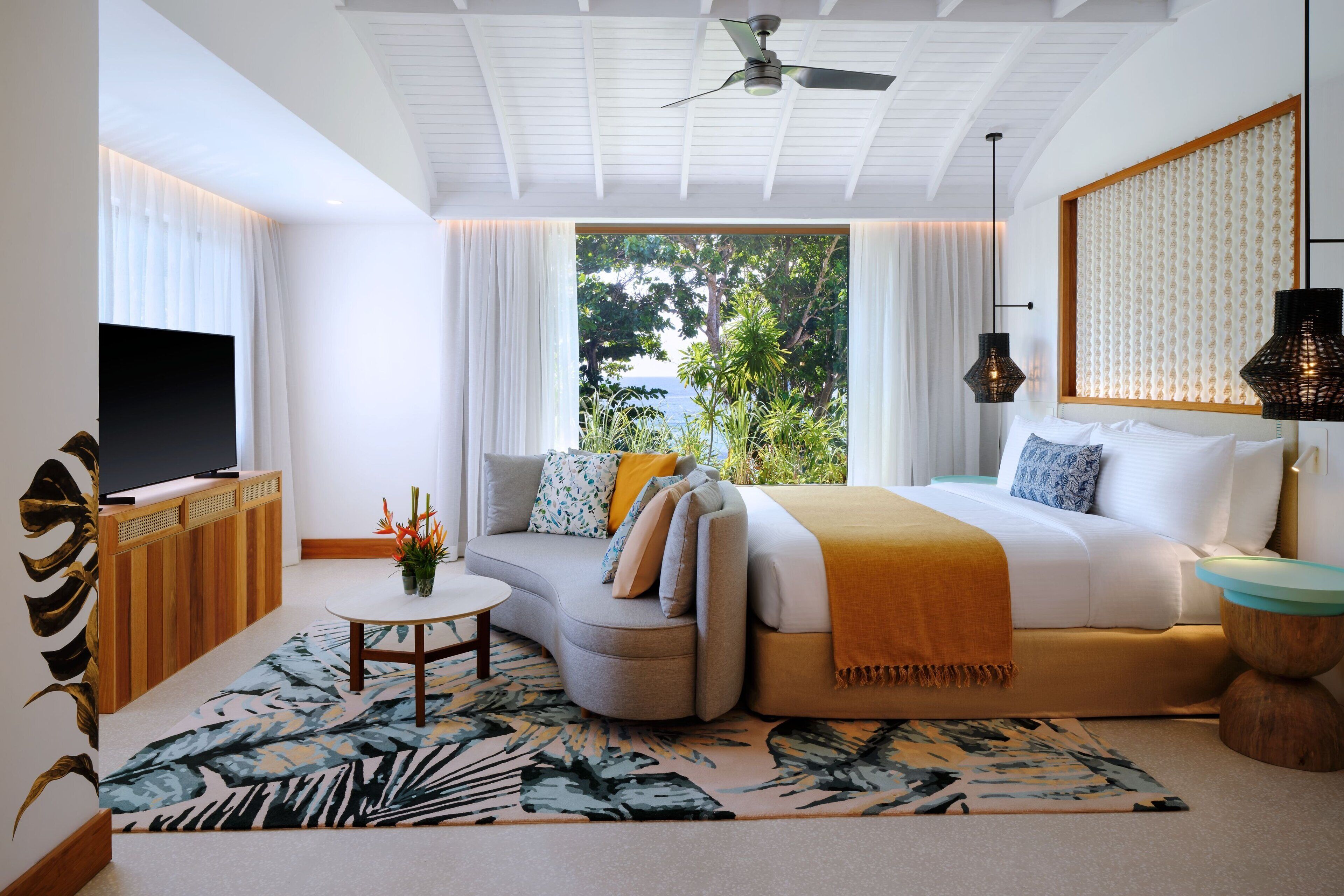 Signature Suite, 1 King Bed, Patio, Sea View | Minibar, in-room safe, individually decorated, individually furnished