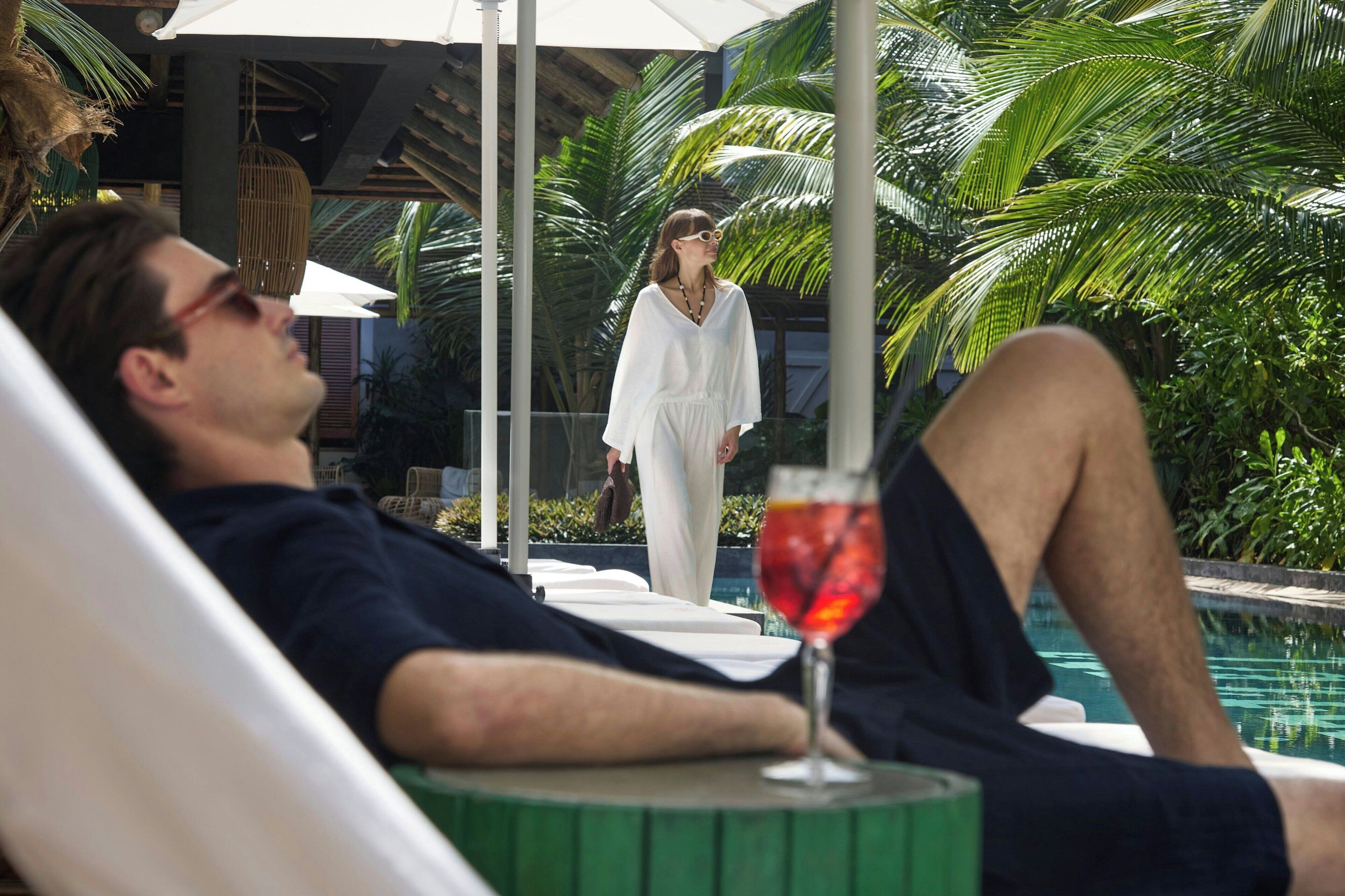 Outdoor pool, pool umbrellas, pool loungers