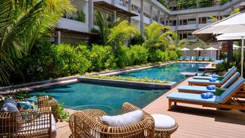 Outdoor pool, pool umbrellas, pool loungers