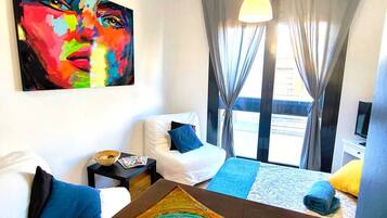 1 dormitorio, tabla de planchar con plancha, cuna de viaje y wifi gratis