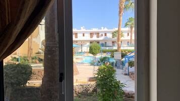 Standard Double Room, 2 Bedrooms, Poolside | Terrace/patio