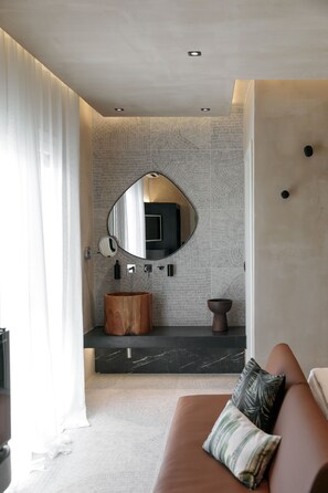 Shower, eco-friendly toiletries, hair dryer, bathrobes