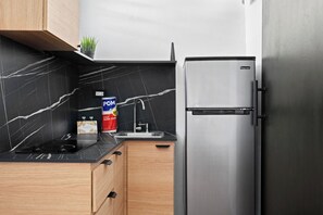 Fridge, microwave, stovetop, coffee/tea maker
