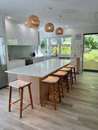 A nature haven within walking distance to beach/town with pool - swim spa- deck.