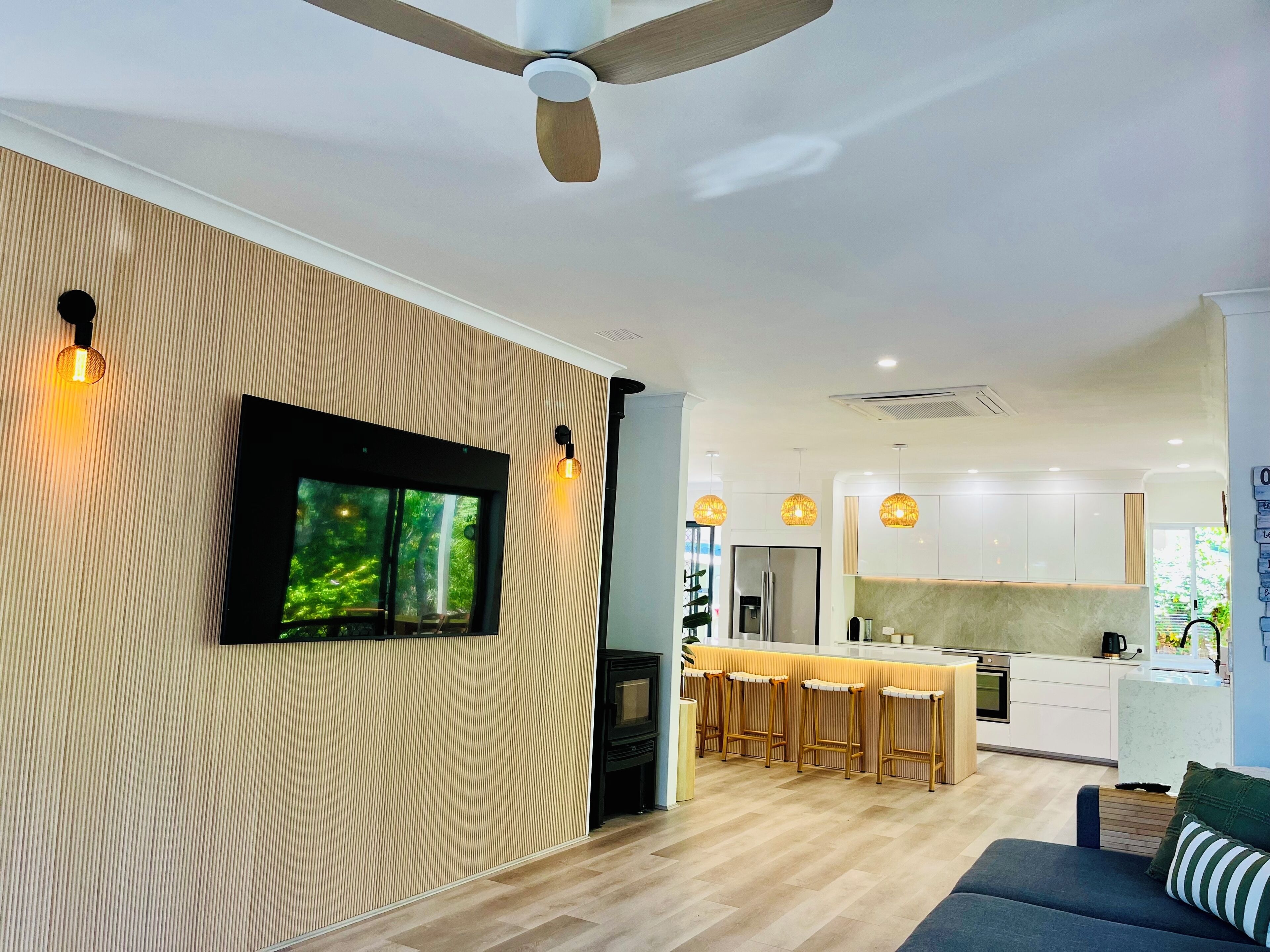 Smart TV, fireplace, books, printers