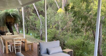 A nature haven within walking distance to beach/town with pool - swim spa- deck.