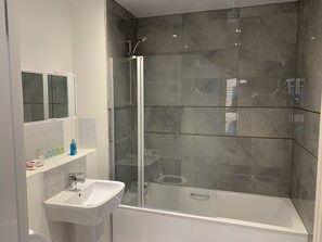 Hair dryer, towels, soap, shampoo