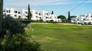 Experience the charm of D'ALMA PORTUGUESA, where modern homes offer balconies and a lush green space with sports facilities.