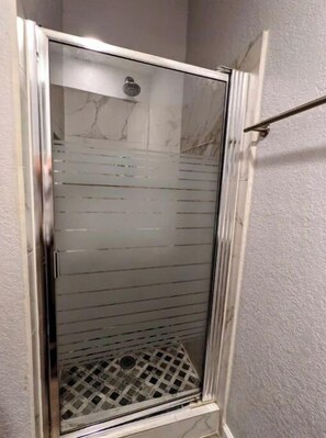 Hair dryer, towels, soap, shampoo