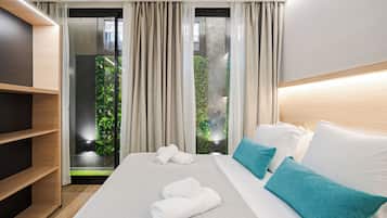 Coffres-forts dans les chambres, fer et planche Ă repasser