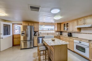 Fridge, microwave, oven, stovetop - Mid-Century meets Southwest in this 4 bedroom Tucson Home (Tucson)
