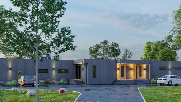 A modern building with a covered entrance, a car parked in front, and a well-maintained lawn. - Wamoon Retreat - The Apartment ~ Luxury Gateway to Wilsons Prom (Yanakie)