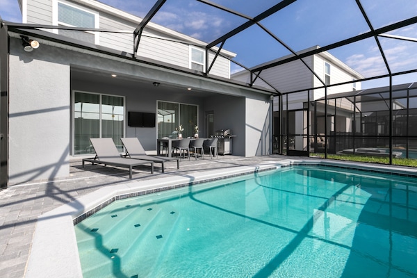 Enjoy the Florida Sun with a pool, lounge chair and Smart TV.