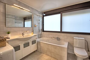Bathtub, hair dryer