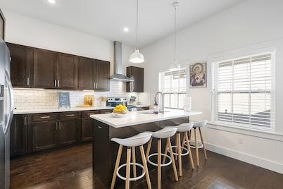 Stylish, dog-friendly condo with WiFi, board games, washer/dyer, & central AC