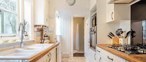 Dishwasher, highchair, cookware/dishes/utensils