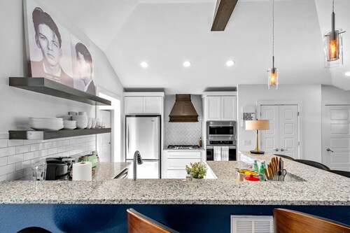 Fully remodeled downtown home with enclosed yard, fireplace, game room & deck