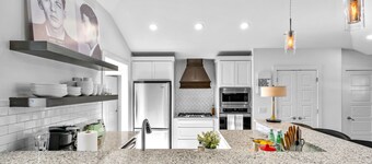 Fully remodeled downtown home with enclosed yard, fireplace, game room & deck