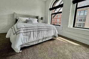 Iron/ironing board, travel crib, free WiFi, bed sheets