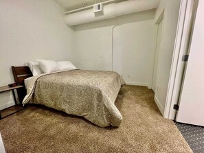 Iron/ironing board, travel crib, free WiFi, bed sheets