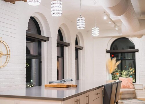 A historic beautifully detailed suite, 1,300 square foot, corner loft in the heart of the Old Market