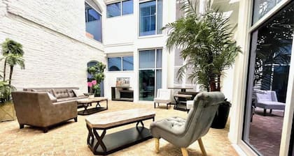 A historic beautifully detailed suite, 1,300 square foot, corner loft in the heart of the Old Market