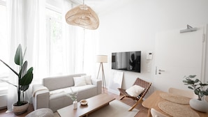 Apartamento | Zona de estar | Una Smart TV