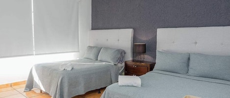 4 bedrooms, desk, iron/ironing board, travel cot