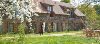 Stylishly furnished fieldstone barn with dining room and terrace by the village pond