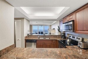 Coffee/tea maker, toaster, dining tables