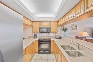 Coffee/tea maker, toaster, dining tables