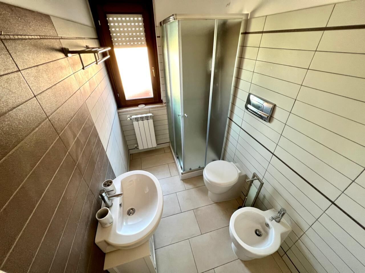premier apartment | bathroom | hair dryer, bidet, heated floors, towels