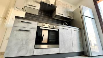 Premier Apartment | Private kitchen | Full-sized fridge, oven, dishwasher, toaster