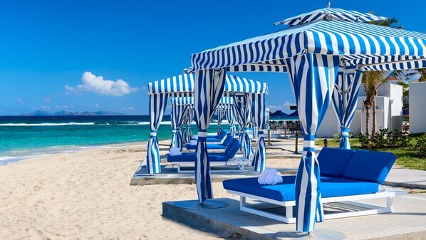 On the beach, sun-loungers, beach towels