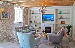 Fernseher, Kamin