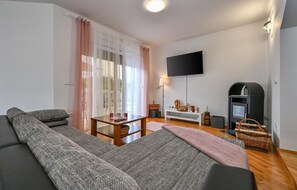 Smart-TV, Kamin, Stereoanlage