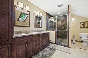 Shower, hair dryer, towels, soap