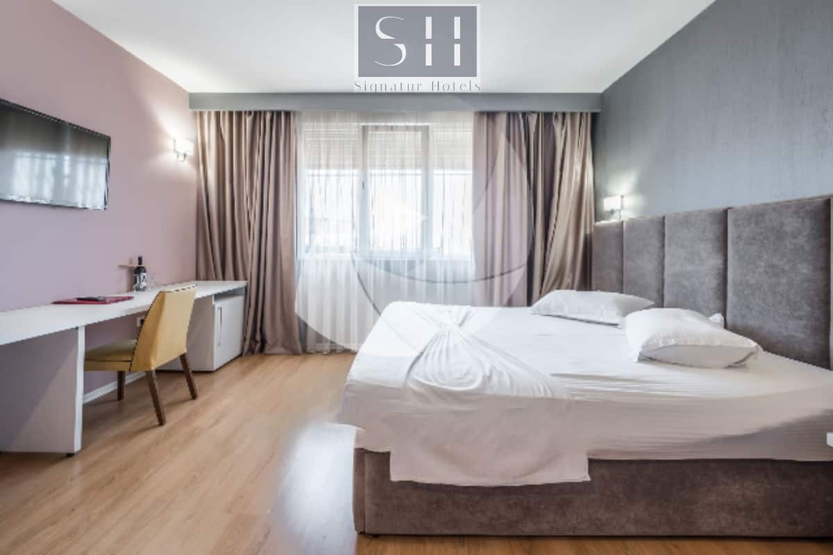 Classic-Doppelzimmer zur Einzelnutzung, 1 King-Bett, Poolzugang, Stadtblick | Bettwäsche aus ägyptischer Baumwolle, hochwertige Bettwaren