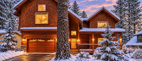 Your Tahoe getaway includes a private hot tub, 4 bedrooms, 3 full bathrooms, two living areas plus a loft, a stone gas fireplace, dining for 10, central A/C, and free EV charging. Professionally prepared for every stay, with local 24/7 guest support.